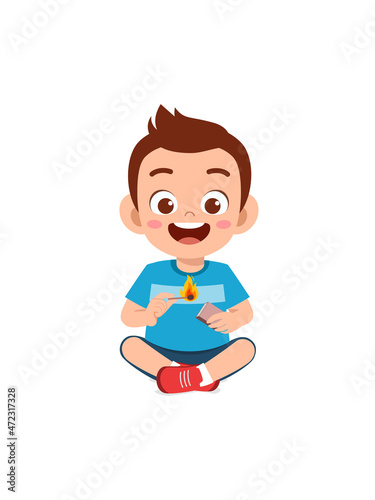 cute little boy holding match stick with fire