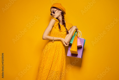 pretty woman wearing sunglasses posing shopping fashion isolated background