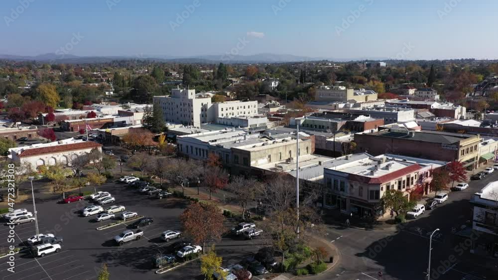 Oroville, California, USA - November 23, 2021: Late afternoon sun shines on historic gold rush era downtown architecture.