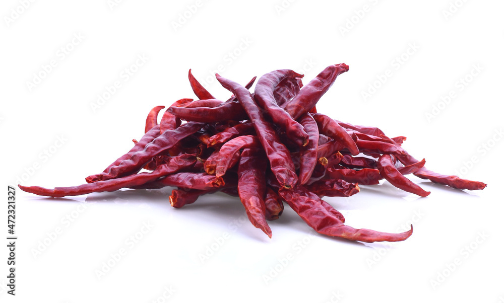 Dried pepper chillies on white background. Dried pepper chillies on white background.