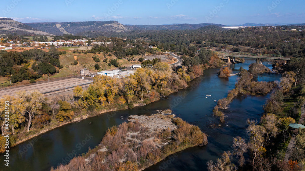Afternoon autumn aerial view of the Feather River as it runs through Oroville, California, USA.