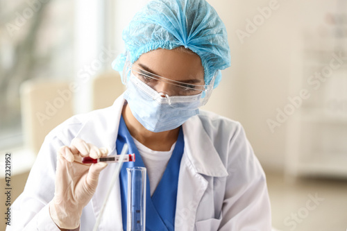 Scientist working with samp...