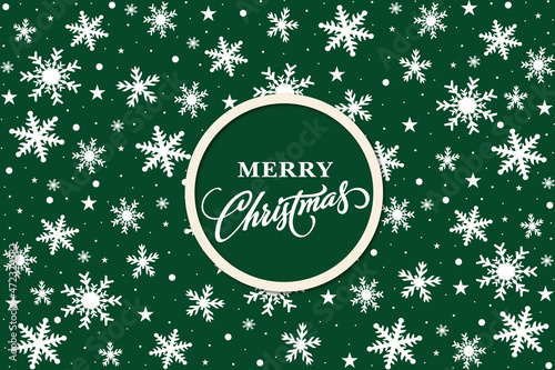 Seamless decorative snowflake pattern on a green background with Merry Christmas text in the middle.