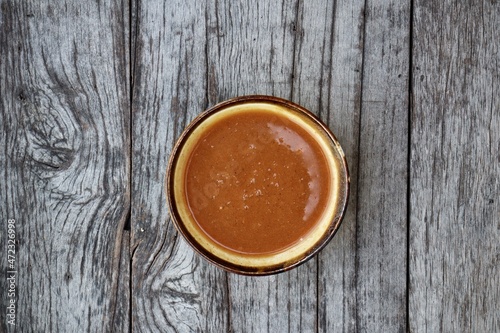 Tamarind sauce on old brown background