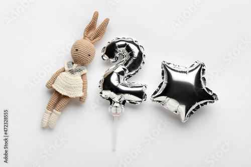 Silver balloon in shape of ...