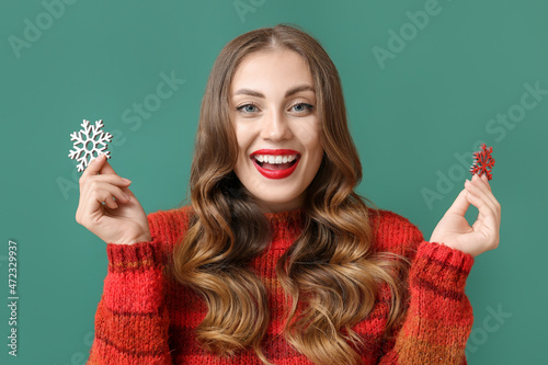 Happy woman holding differe...