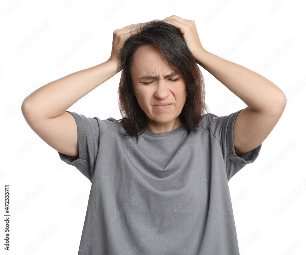Mature woman suffering from headache on white background Mature woman suffering from headache on white background