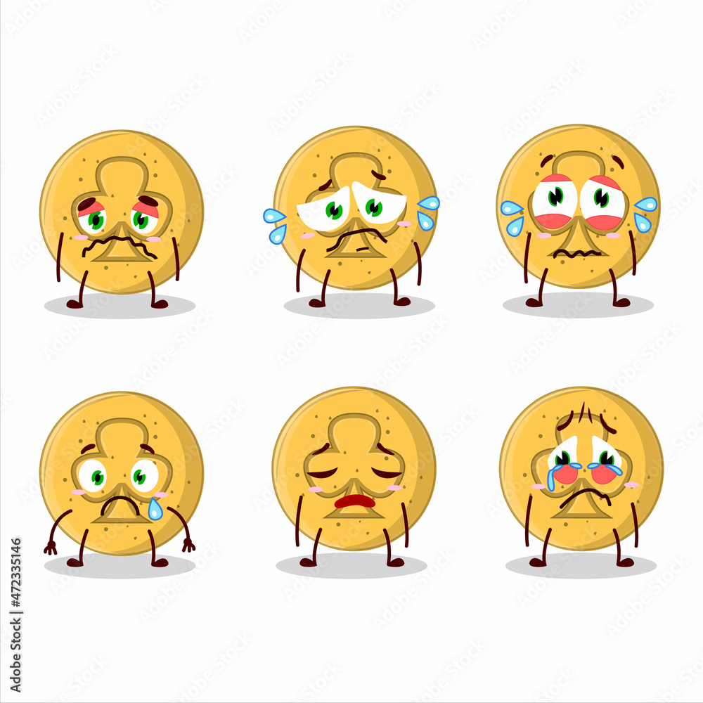 Dalgona candy trefoils cartoon character with sad expression Dalgona candy trefoils cartoon character with sad expression