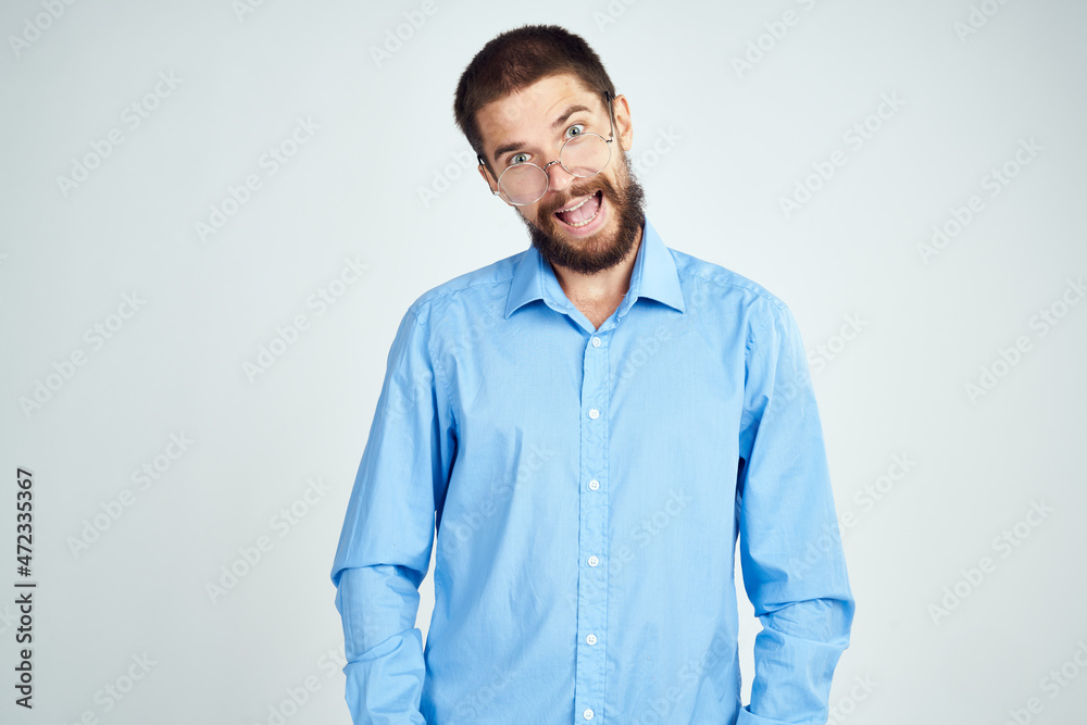 Fototapeta premium manager wearing glasses posing office work light background