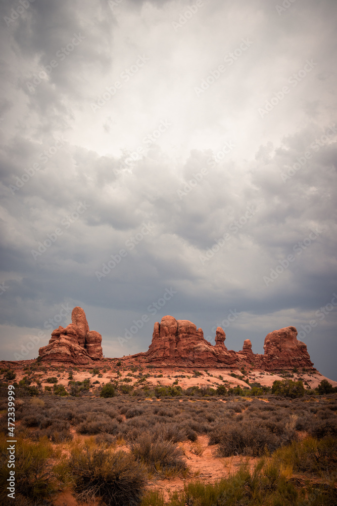 Beautiful View of Red Rocks and storm clouds in the sky, Arches National Park, Utah, USA