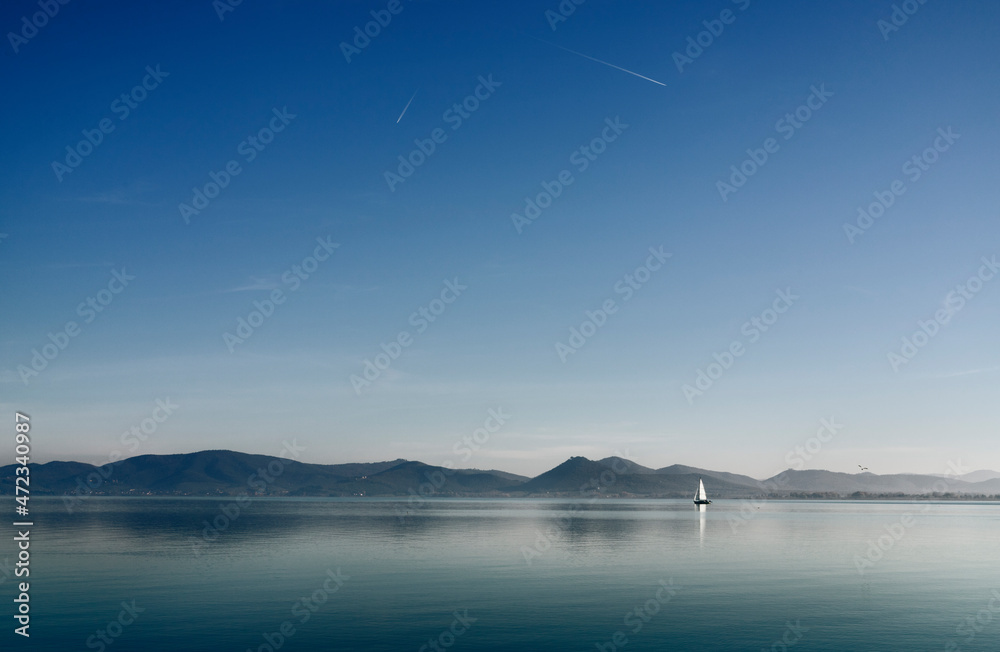 Lake Trasimeno , Italy with sail boat