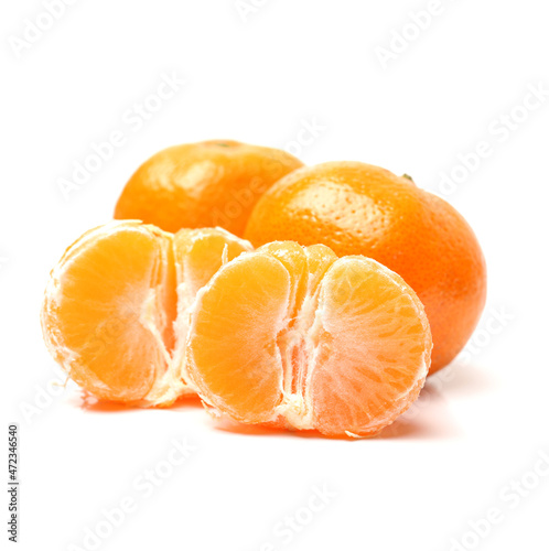 peeled tangerine isolated on white