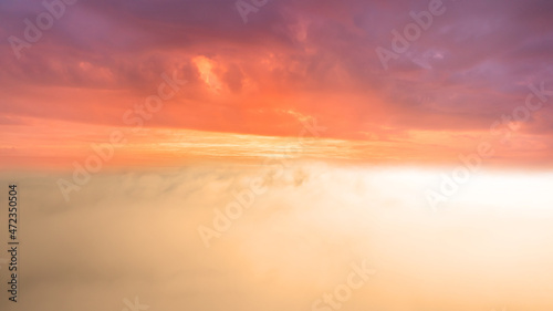 Orange sky above the clouds © DZiegler