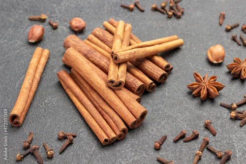 Cinnamon sticks, Star anise, cloves and nuts - Traditional Christmas spices.