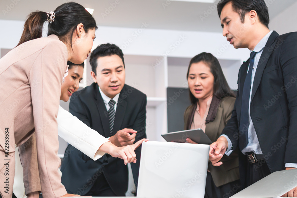 Group of coworkers in conference room during meeting, Business people in board room meeting at the office Group of coworkers in conference room during meeting, Business people in board room meeting at the office