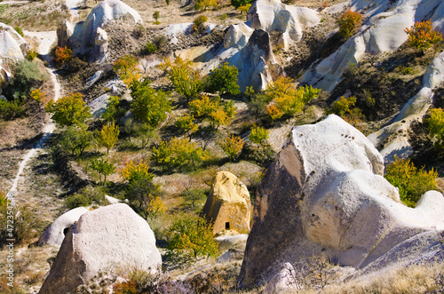 Beautiful landscape view of unusual rock formations. Three sisters (Uc Guzeller) rock. Amazing shaped sandstone rocks. Popular travel destination in Turkey. UNESCO World Heritage Site