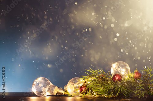 Fototapeta Naklejka Na Ścianę i Meble -  Christmas background with Christmas lights and fir branch