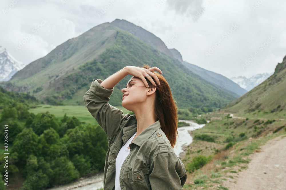 woman hiker mountains landscape travel freedom fresh air