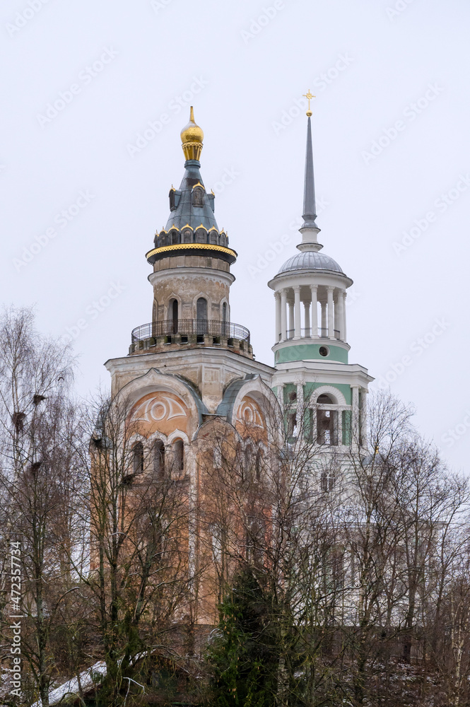 View of architectural ensemble of ancient monastery in Russian city  Torzhok, Tver region. Vertical photo