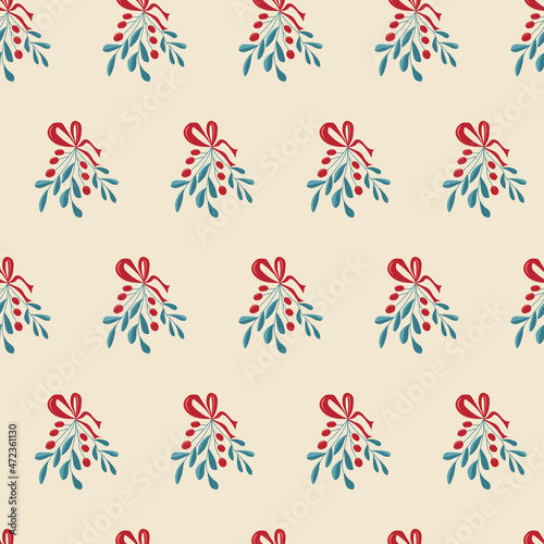 Seamless festive pattern of mistletoe branches on beige background. Vector illustration for background, decor, fabrics and postcards