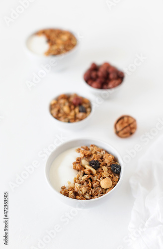 Homemade breakfast granola with nuts and raisins. Healthy food.