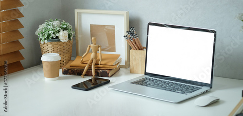 Konstfotografi Home office desk with laptop computer, notebook and smart phone..