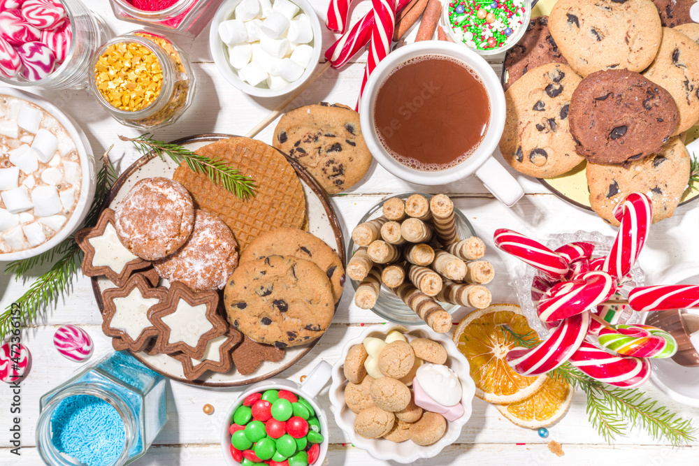 Christmas hot chocolate party bar, winter cocoa buffet with a lot of hot chocolate mugs, various topping, sprinkles, sweet appetizers Christmas hot chocolate party bar, winter cocoa buffet with a lot of hot chocolate mugs, various topping, sprinkles, sweet appetizers