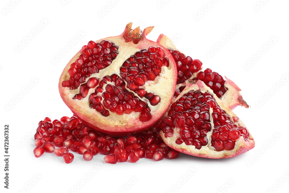 Cut ripe pomegranate on white background. Delicious fruit Cut ripe pomegranate on white background. Delicious fruit
