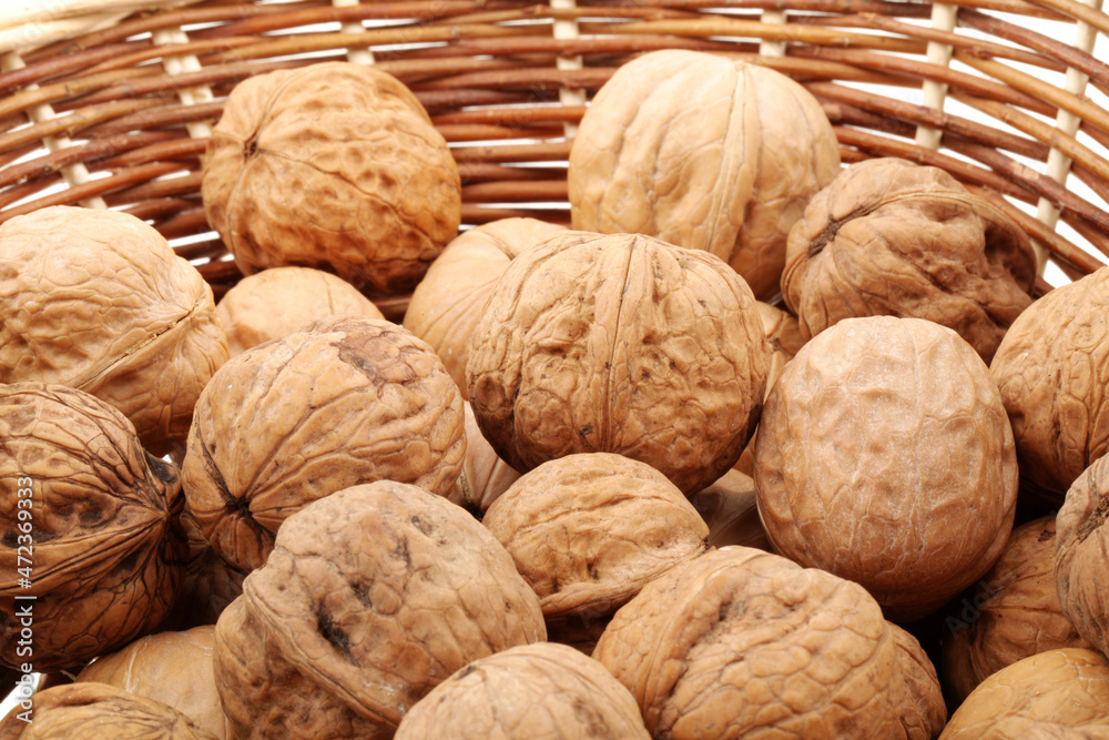 walnuts on wooden background walnuts on wooden background