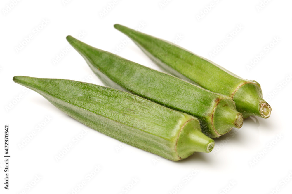Fresh young okra isolated on white background Fresh young okra isolated on white background