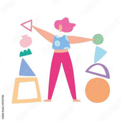 Young woman doing exercise with geometric shapes