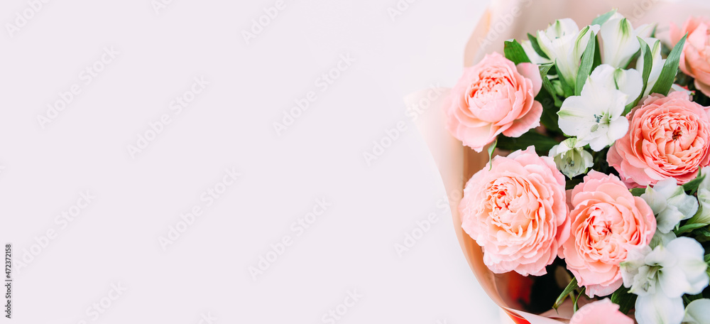 Luxurious bouquet of fresh pastel pale pink roses