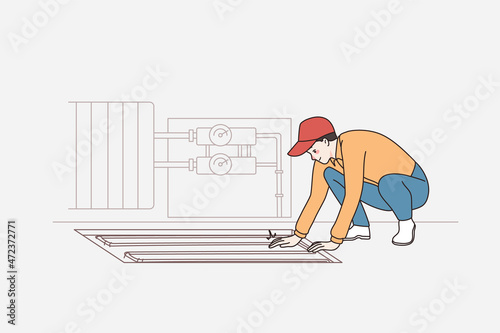 Repairing and construction works concept. Positive young worker in cap sitting and making flooring for apartment vector illustration 