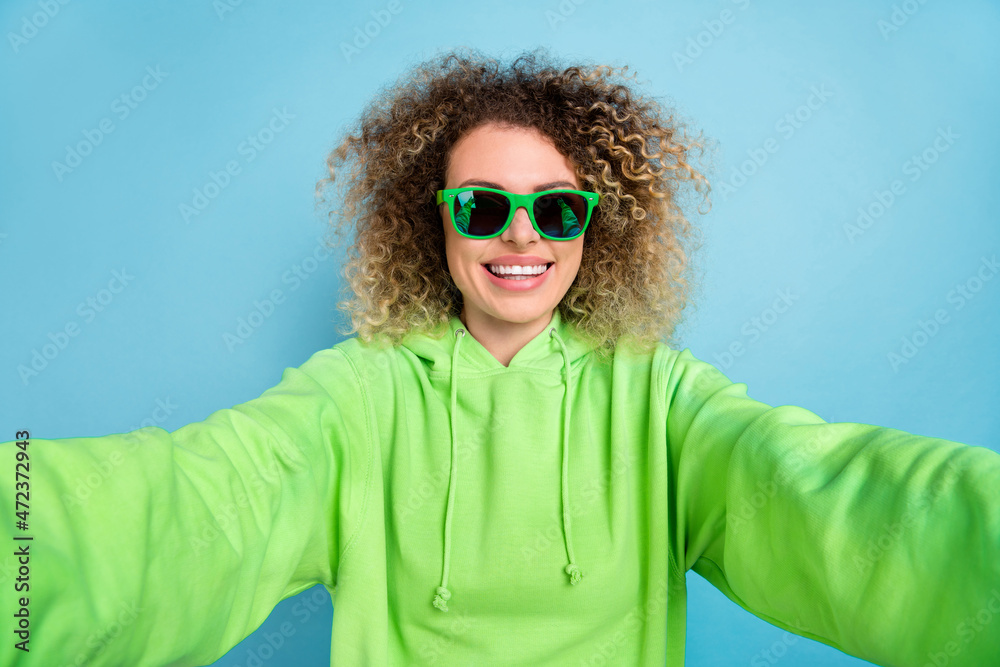 Photo of popular blogger lady beaming smile take selfie wear sunglass green hoodie isolated pink color background