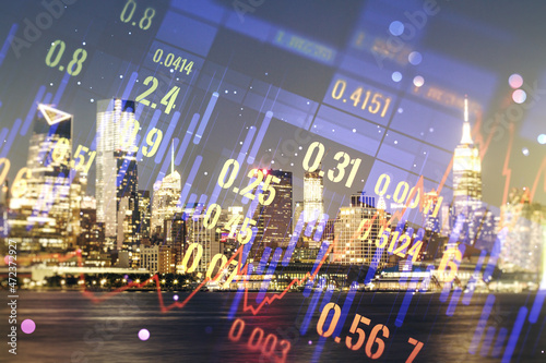 Double exposure of abstract creative financial chart hologram on New York skyscrapers background, research and strategy concept © Pixels Hunter