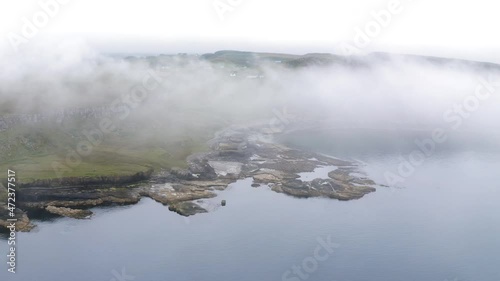 Drone dropping through the clouds at the beach in Culnacnoc, Isle of Skye, Scotland