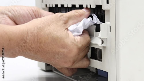 Paper Stuck, Paper Jam In Printer At Office concept office equipment problem