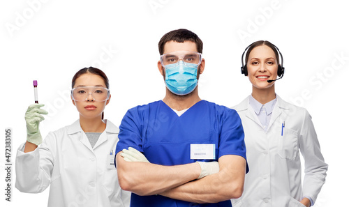 medicine  profession and healthcare concept - group of doctors and nurse with with blood test over white background