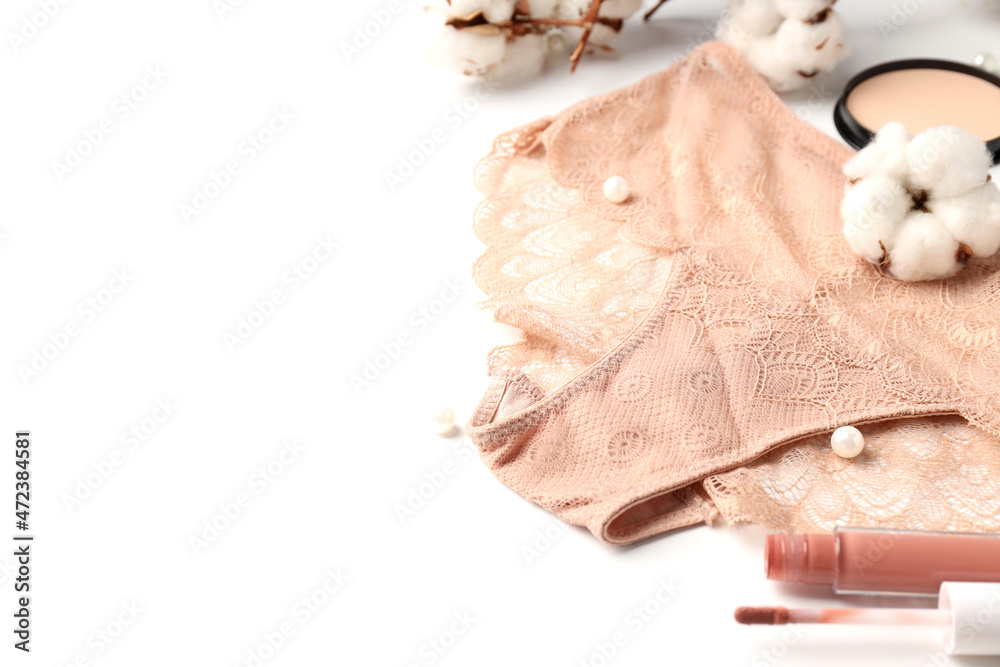 Concept of female clothes with panties on white background Concept of female clothes with panties on white background