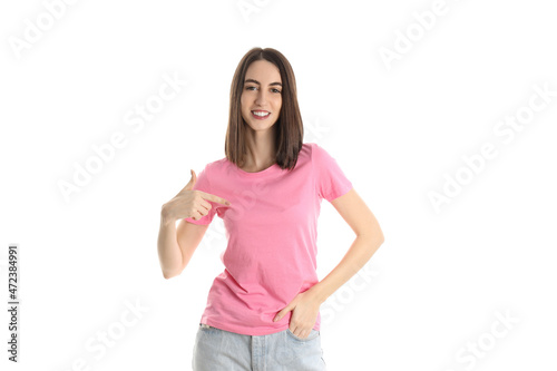 Attractive girl in pink t-shirt isolated on white background