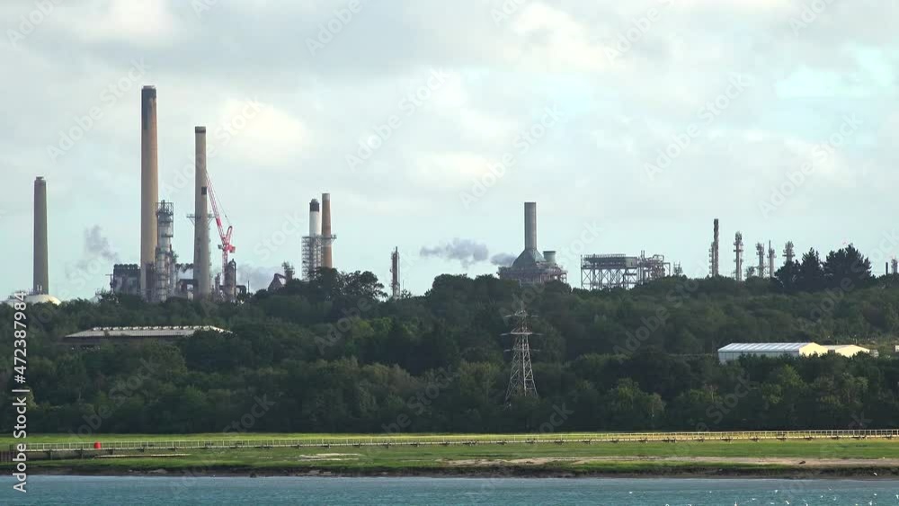 factory in the city with chimneys and smoke factory in the city with chimneys and smoke