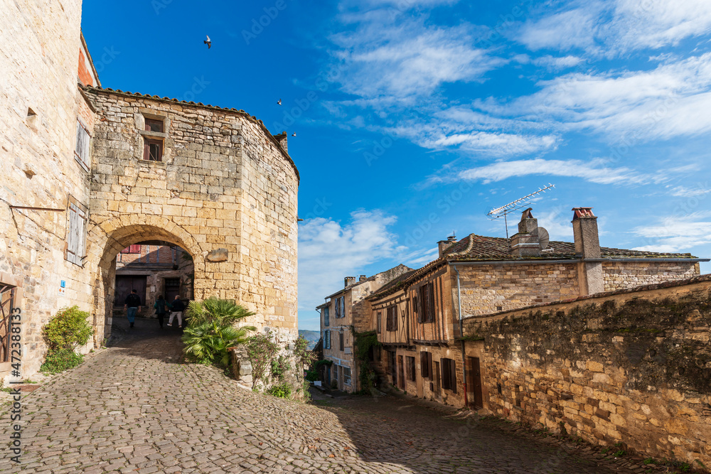 Obraz premium Old street and porch of the medieval village of Cordes sur Ciel, in the Tarn, in Occitanie, France
