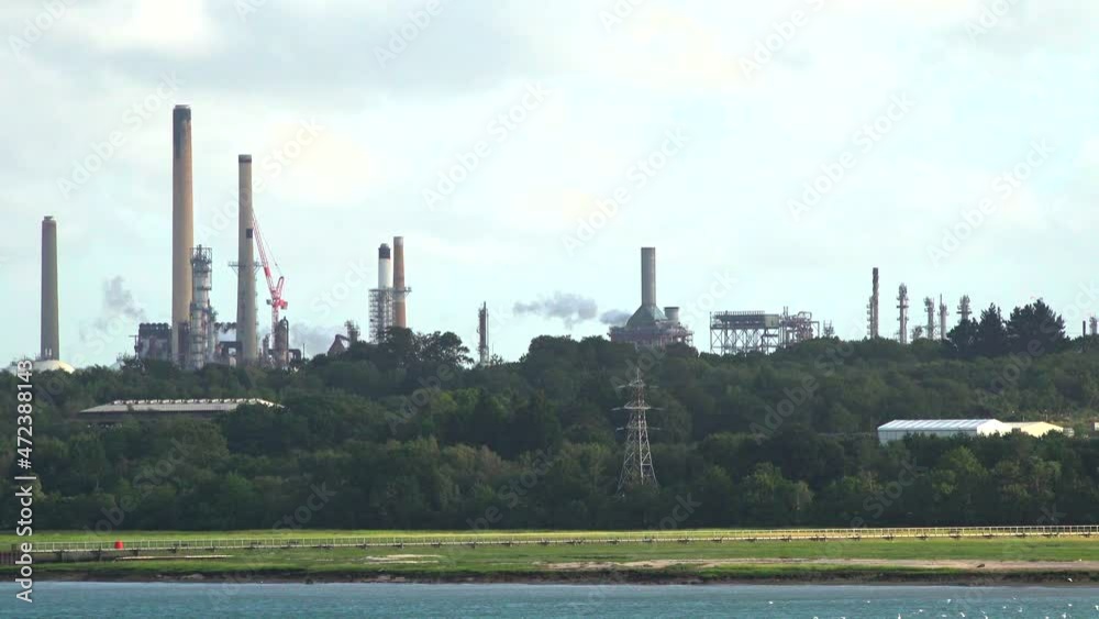 factory in the city with chimneys and smoke factory in the city with chimneys and smoke