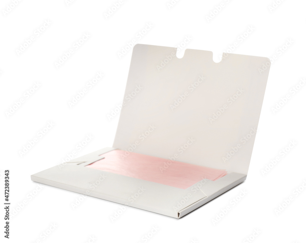 Package of facial oil blotting tissues isolated on white. Mattifying wipes