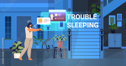 tired woman with electronic smart watch app tracker on hand quality and quantity sleep control concept