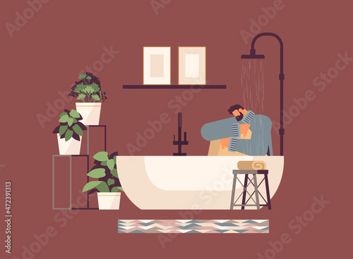 unhappy depressed man sitting in shower guy feeling desperate and lonely mental health diseases depression stress