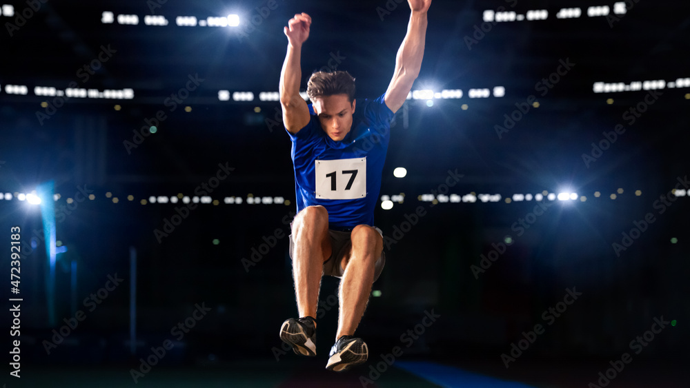 Long Jump Championship: Professional Male Athlete Jumping on Long Distance. Determination, Motivation, Inspiration of a Successful Sports Man Setting New Record Result. Competition on Big Stadium.