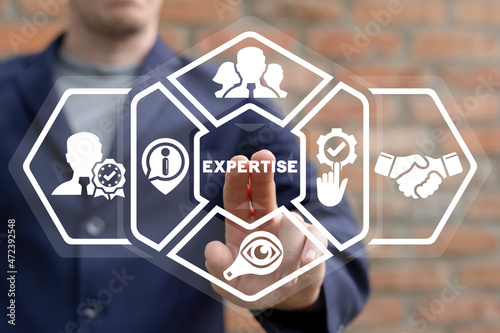 Expertise business consulting concept. Expert using a virtual touch screen clicks on expertise word.