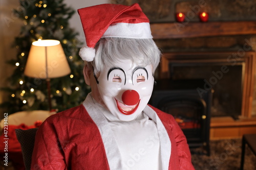 Foto Freaky Santa Claus with clown face