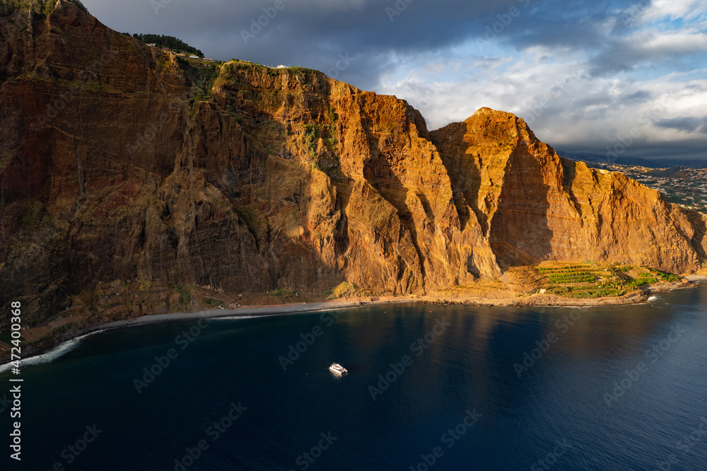 Rocky cliff near blue sea